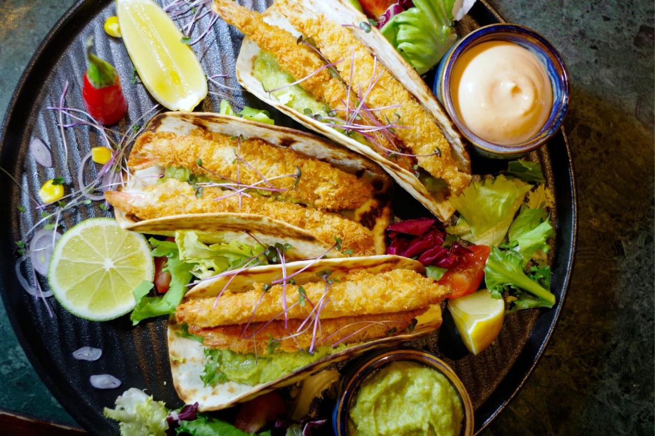 Sheraton Poznan Hotel Bagian luar foto Tacos