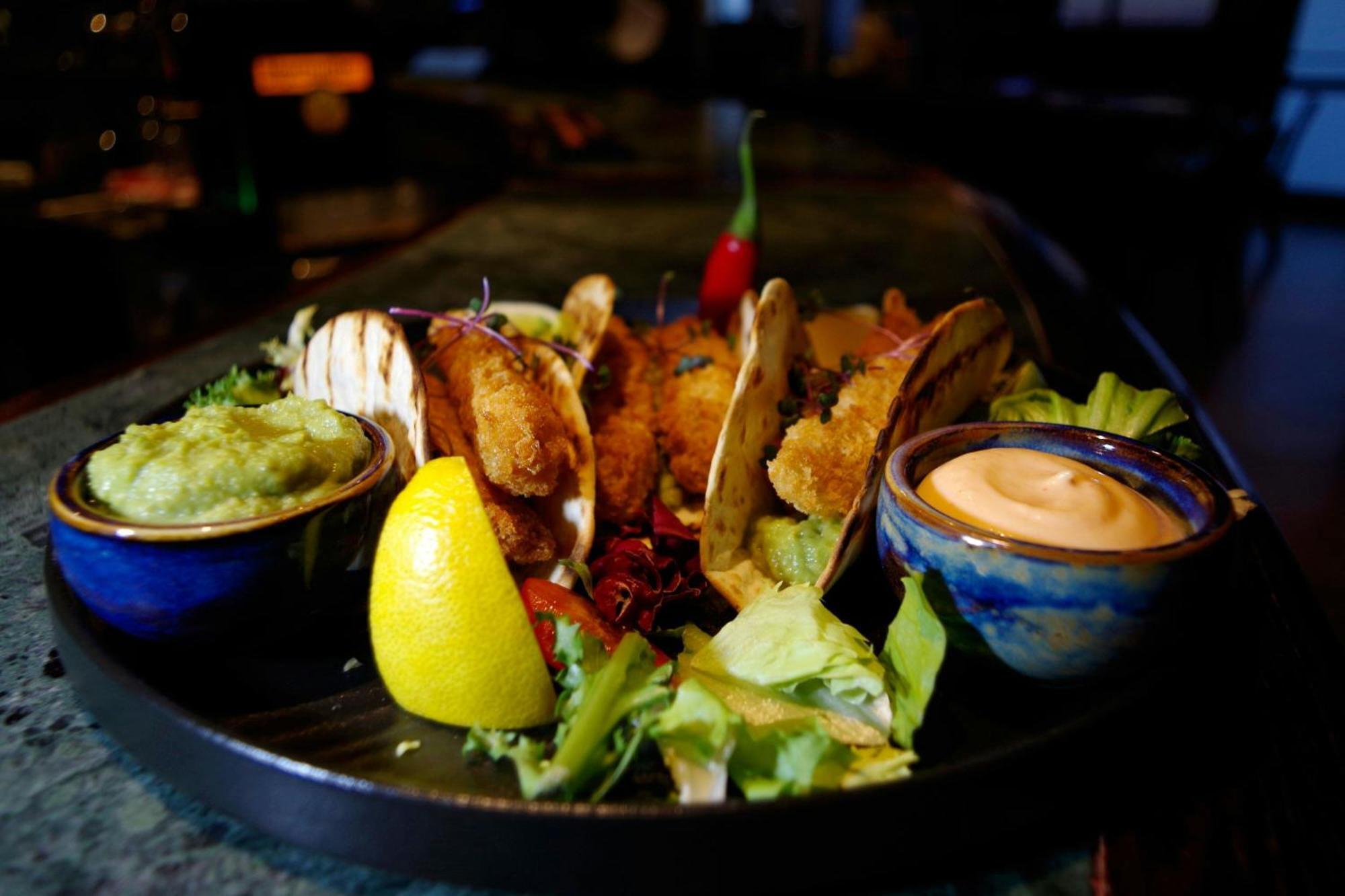 Sheraton Poznan Hotel Bagian luar foto A plate of tacos